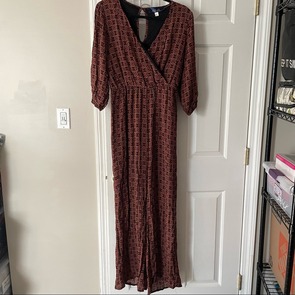 Francesca’s “Blue Rain” large printed jumpsuit